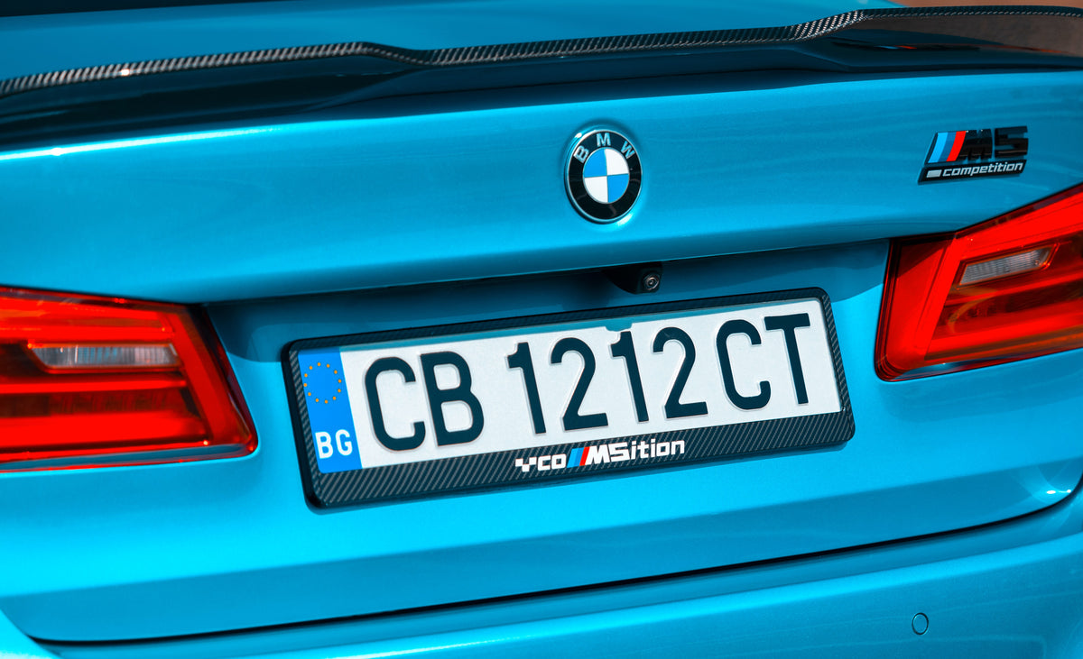 com5ition owner first carbon style license plate frame